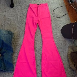 Neon pink bell bottoms